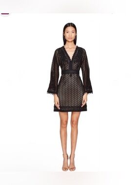 The Kooples Black
Embroidered V-Neck long sleeve Mini dress size XS.
NWOT